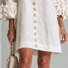 Claudia | Vestido mini de botones con estampado floral - Isabel de Sevilla