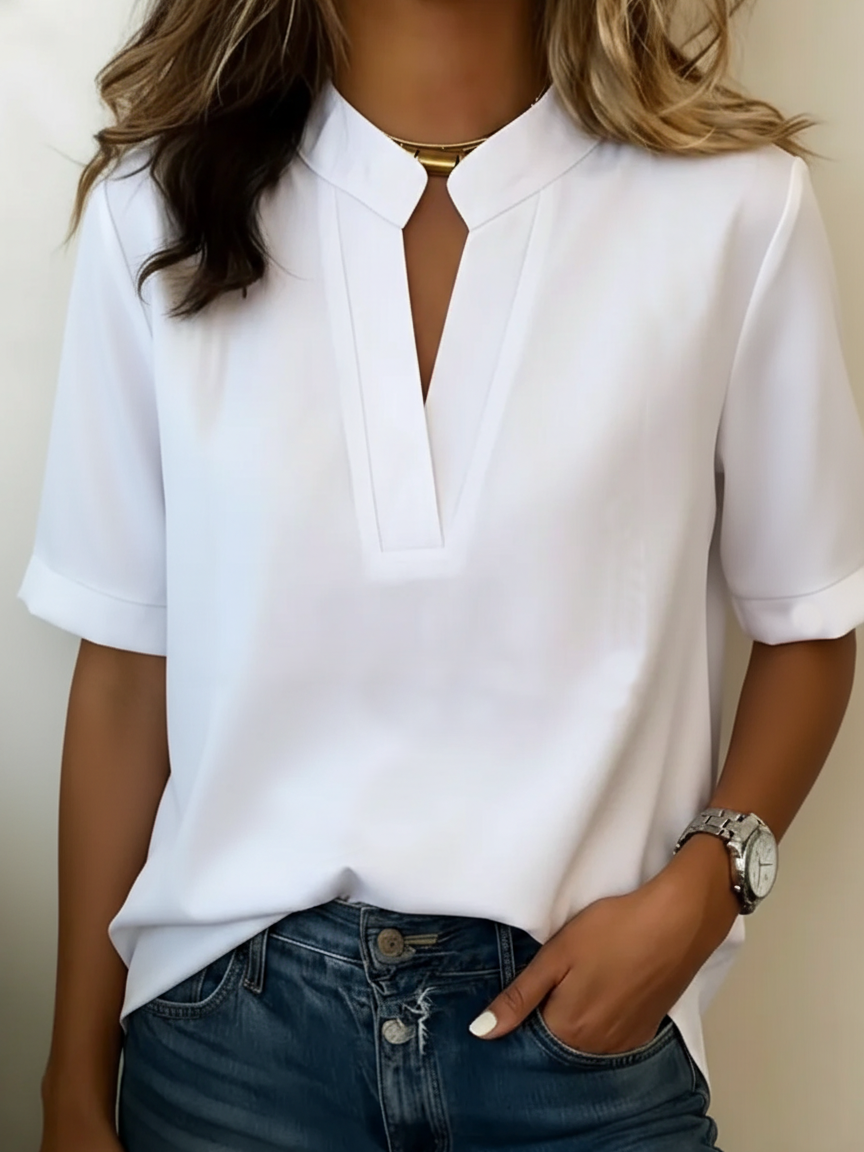 Bárbara | Blusa elegante con cuello en V y detalles dorados.